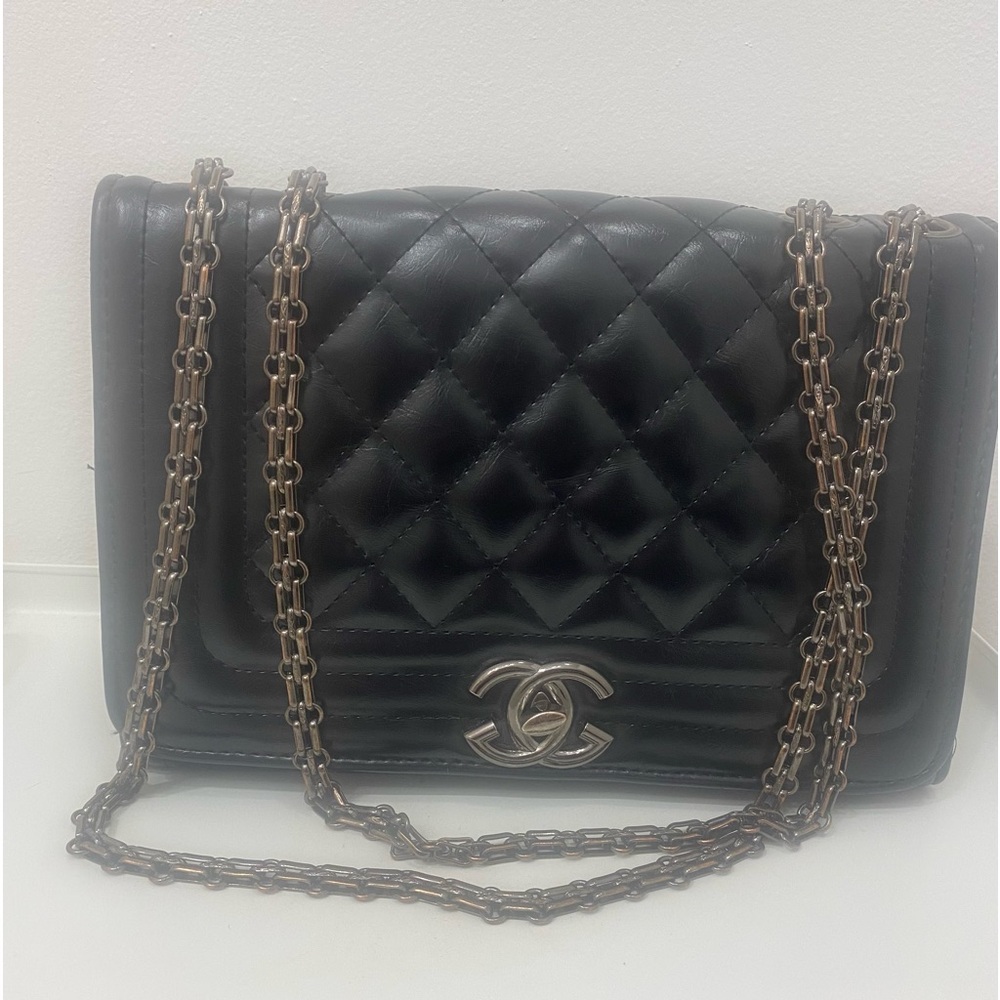Cross body bag with chain strap